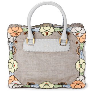 Skin bag with linen embroidered dress detail. Skin bag with linen embroidered dress detail.