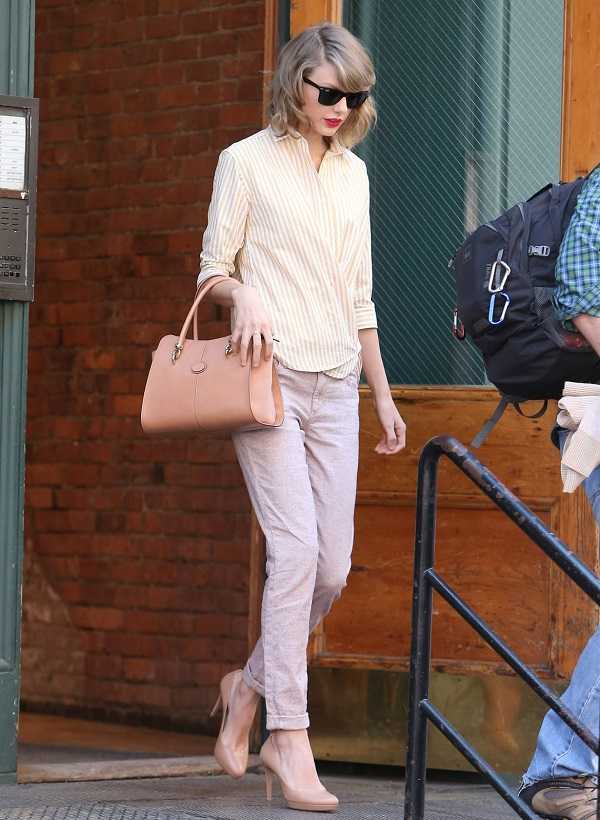 Taylor Swift ya se unió a la tendencia pastel con este outfit perfecto para trabajar. ¡No olvides el bolso!
